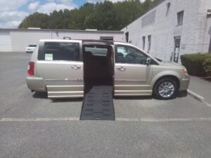 Gold Chrysler Town and Country with BraunAbility Side Entry Automatic Fold Out conversion