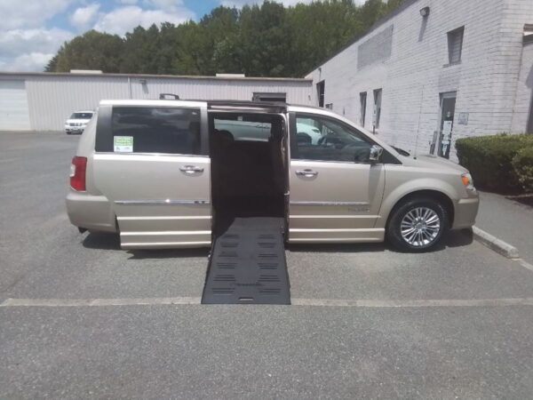 Gold Chrysler Town and Country with BraunAbility Side Entry Automatic Fold Out conversion