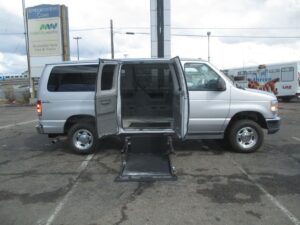Silver Ford Econoline with Norcal Side Entry Automatic Fold Out conversion
