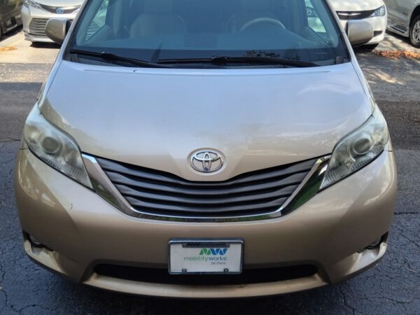Gold Toyota Sienna with BraunAbility Side Entry Automatic Fold Out conversion