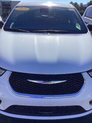 White Chrysler Pacifica with BraunAbility Side Entry Automatic Fold Out conversion