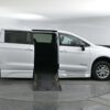 White Chrysler Pacifica with BraunAbility Side Entry Automatic Fold Out conversion