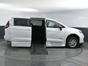 White Chrysler Pacifica with BraunAbility Side Entry Automatic Fold Out conversion