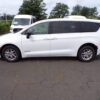White Chrysler Voyager with Driverge Side Entry Automatic Fold Out conversion
