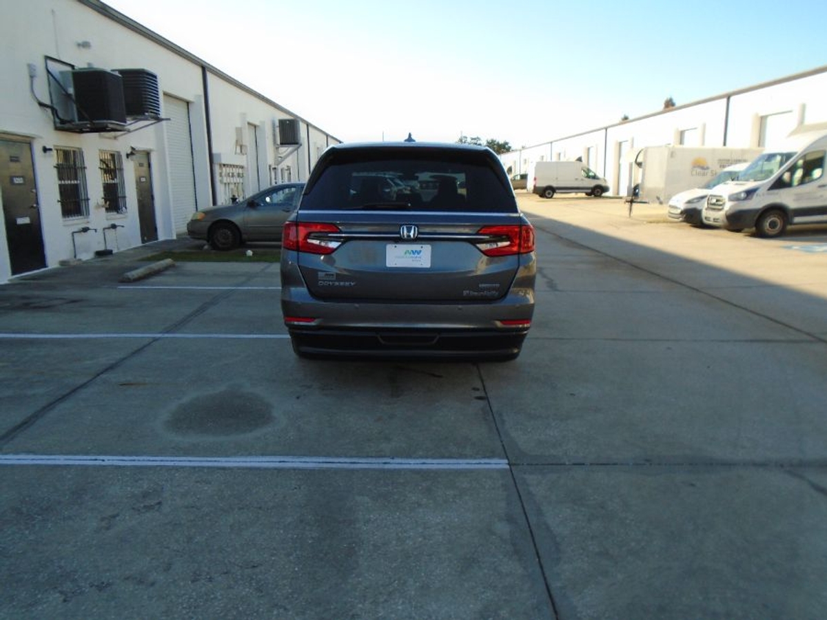 Grey Honda Odyssey with BraunAbility Side Entry Automatic In Floor conversion