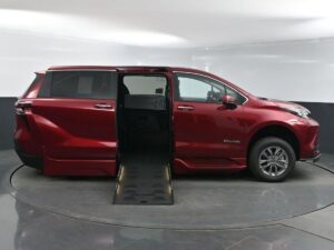 Red Toyota Sienna with BraunAbility Side Entry Automatic Fold Out conversion