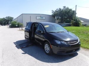 Black Chrysler Voyager with Driverge Side Entry Automatic Fold Out conversion