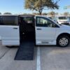 White Dodge Grand Caravan with BraunAbility Side Entry Manual Fold Out conversion