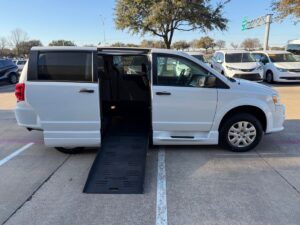 White Dodge Grand Caravan with BraunAbility Side Entry Manual Fold Out conversion
