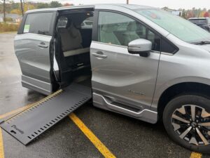 Silver Honda Odyssey with BraunAbility Side Entry Automatic In Floor conversion