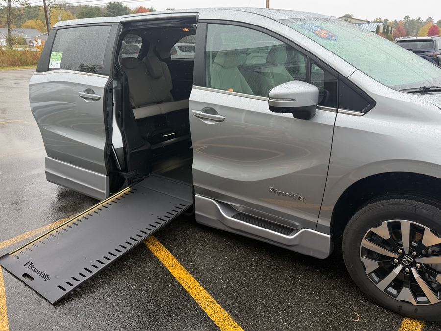 Silver Honda Odyssey with BraunAbility Side Entry Automatic In Floor conversion
