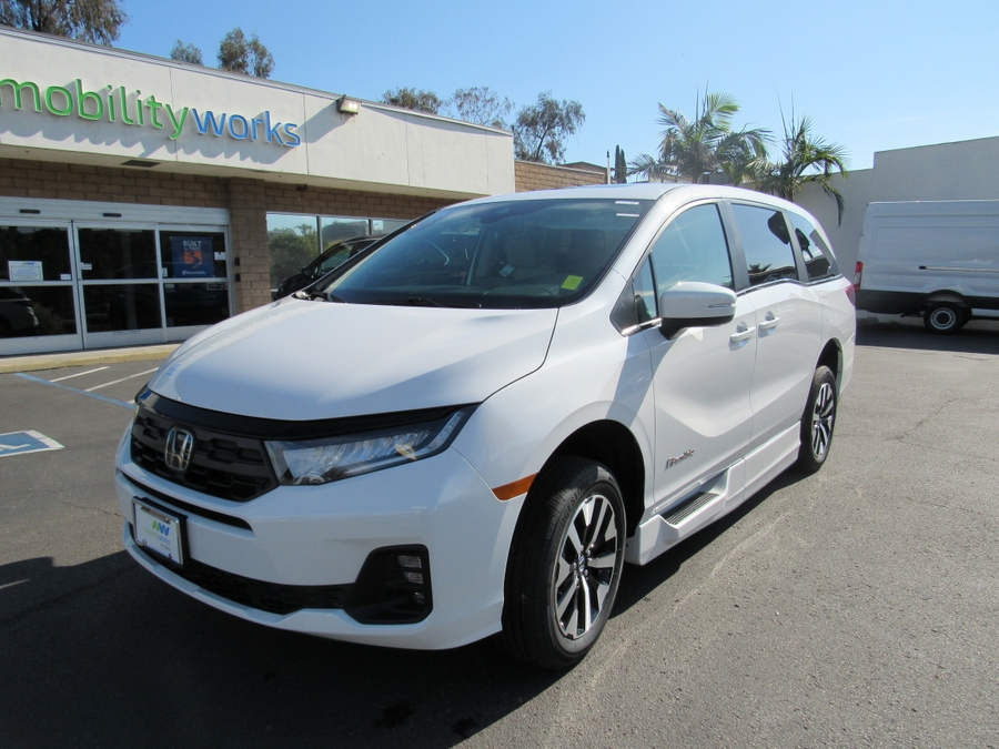 White Honda Odyssey with BraunAbility Side Entry Automatic In Floor conversion