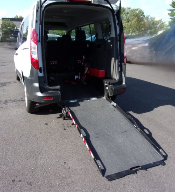 White Ford Transit Connect with Driverge Rear Entry Manual Fold Out conversion