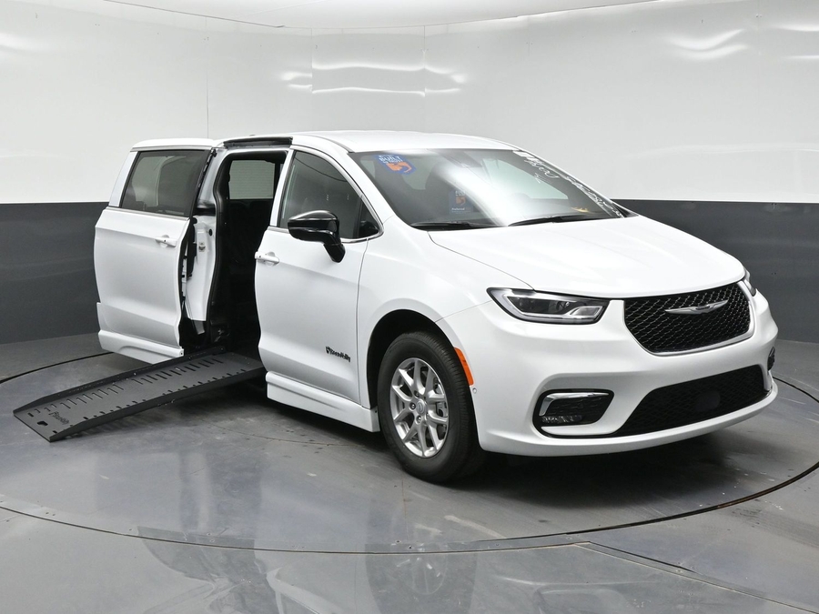 White Chrysler Pacifica with BraunAbility Side Entry Automatic Fold Out conversion
