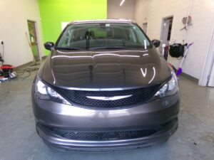 Grey Chrysler Voyager with BraunAbility Side Entry Automatic Fold Out conversion