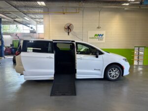 White Chrysler Pacifica with BraunAbility Side Entry Automatic Fold Out conversion