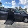 Grey Chrysler Voyager with BraunAbility Side Entry Automatic Fold Out conversion