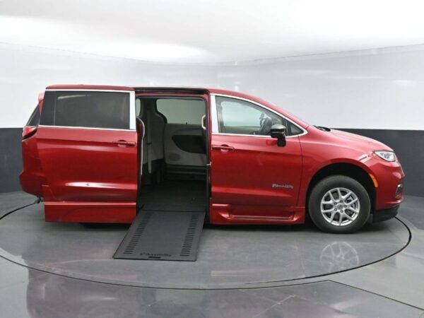 Red Chrysler Pacifica with BraunAbility Side Entry Automatic In Floor conversion