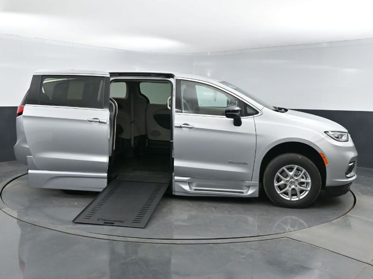 Silver Chrysler Pacifica with BraunAbility Side Entry Automatic In Floor conversion