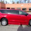 Red Chrysler Pacifica with BraunAbility Side Entry Automatic In Floor conversion