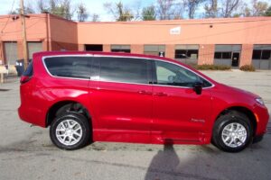 Red Chrysler Pacifica with BraunAbility Side Entry Automatic In Floor conversion