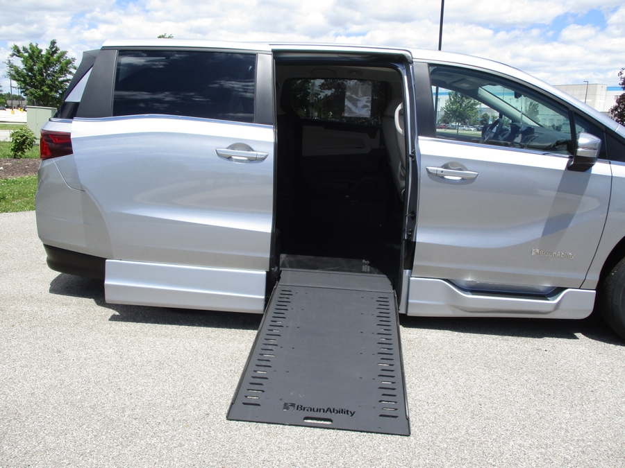 Silver Honda Odyssey with BraunAbility Side Entry Automatic In Floor conversion