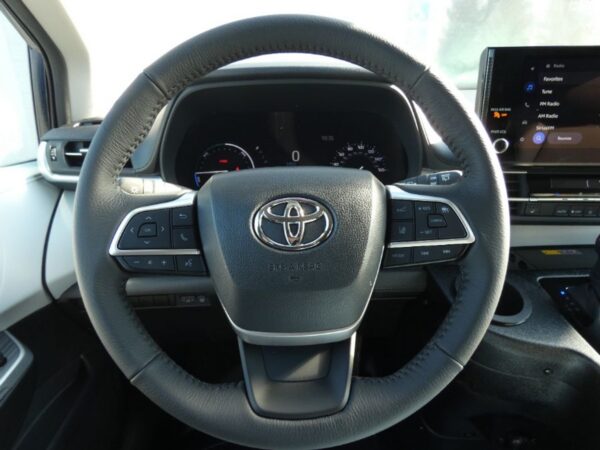 Blue Toyota Sienna with BraunAbility Side Entry Automatic Fold Out conversion