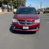 Red Dodge Grand Caravan with BraunAbility Side Entry Automatic Fold Out conversion