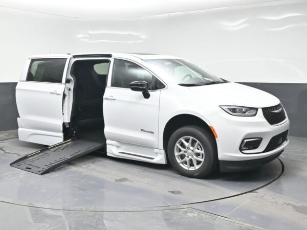 White Chrysler Pacifica with BraunAbility Side Entry Automatic Fold Out conversion