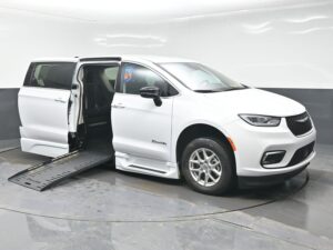 White Chrysler Pacifica with BraunAbility Side Entry Automatic Fold Out conversion