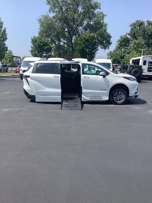 White Toyota Sienna with BraunAbility Side Entry Automatic Fold Out conversion