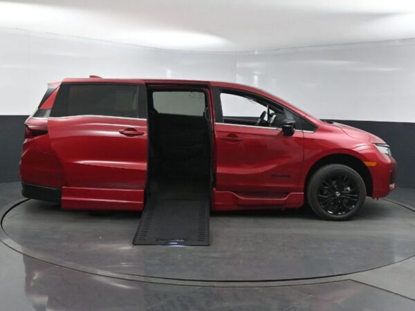 Red Honda Odyssey with BraunAbility Side Entry Automatic In Floor conversion