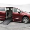 Red Chrysler Voyager with BraunAbility Side Entry Automatic Fold Out conversion