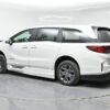 White Honda Odyssey with BraunAbility Side Entry Automatic In Floor conversion