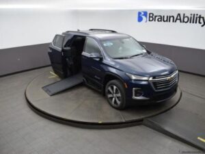 Blue Chevrolet Traverse with BraunAbility Side Entry Automatic In Floor conversion