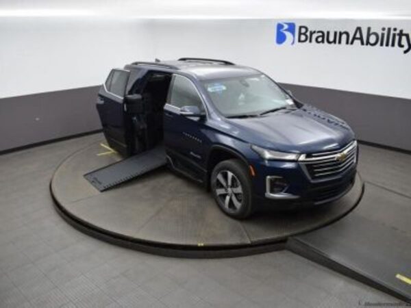 Blue Chevrolet Traverse with BraunAbility Side Entry Automatic In Floor conversion