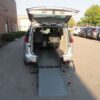 Silver Chrysler Pacifica with Driverge Rear Entry Manual Fold Out conversion