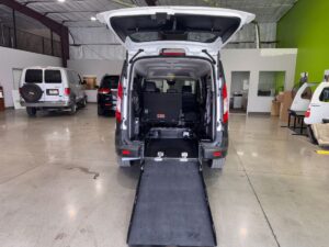 White Ford Transit Connect with Driverge Rear Entry Manual Fold Out conversion