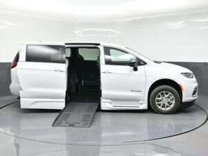 White Chrysler Pacifica with BraunAbility Side Entry Automatic Fold Out conversion