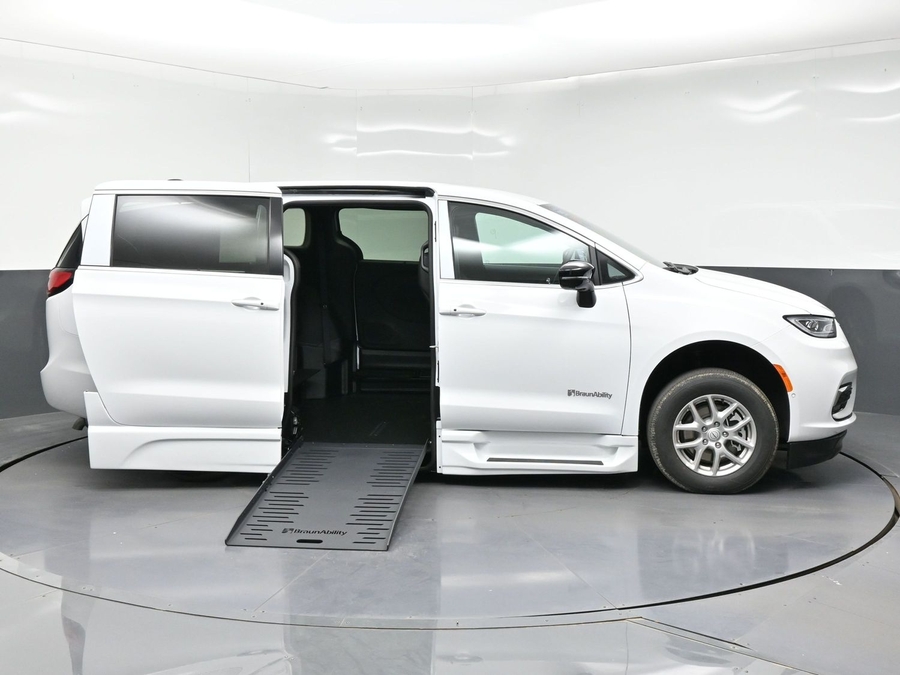 White Chrysler Pacifica with BraunAbility Side Entry Automatic Fold Out conversion