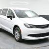 White Chrysler Voyager with BraunAbility Rear Entry Manual Fold Out conversion