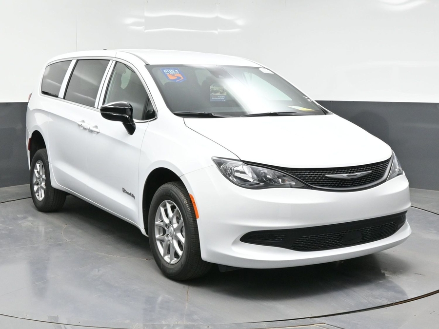 White Chrysler Voyager with BraunAbility Rear Entry Manual Fold Out conversion