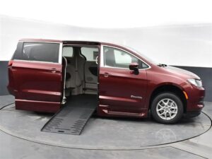 Red Chrysler Voyager with BraunAbility Side Entry Automatic Fold Out conversion