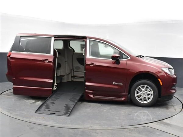 Red Chrysler Voyager with BraunAbility Side Entry Automatic Fold Out conversion