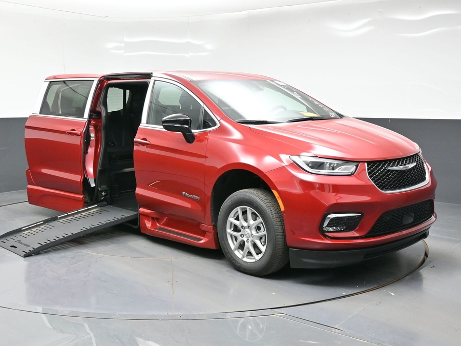 Red Chrysler Pacifica with BraunAbility Side Entry Automatic Fold Out conversion