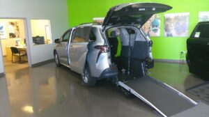 Silver Toyota Sienna with Driverge Rear Entry Manual Fold Out conversion