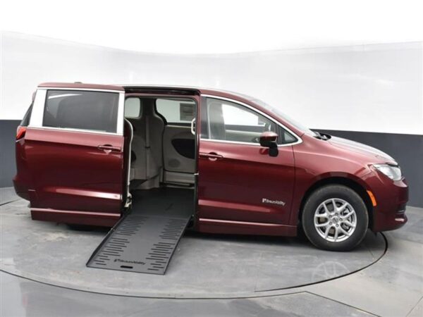 Red Chrysler Voyager with BraunAbility Side Entry Automatic Fold Out conversion