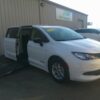 White Chrysler Voyager with Driverge Side Entry Automatic Fold Out conversion