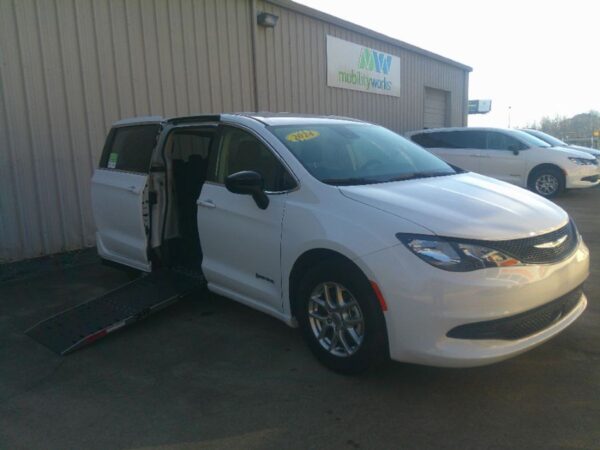 White Chrysler Voyager with Driverge Side Entry Automatic Fold Out conversion