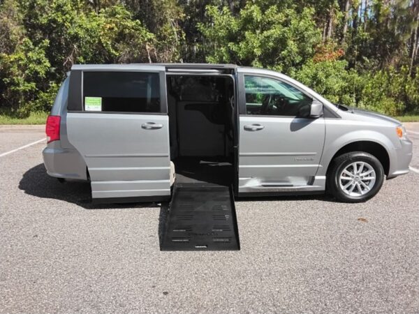 Silver Dodge Grand Caravan with BraunAbility Side Entry Automatic Fold Out conversion